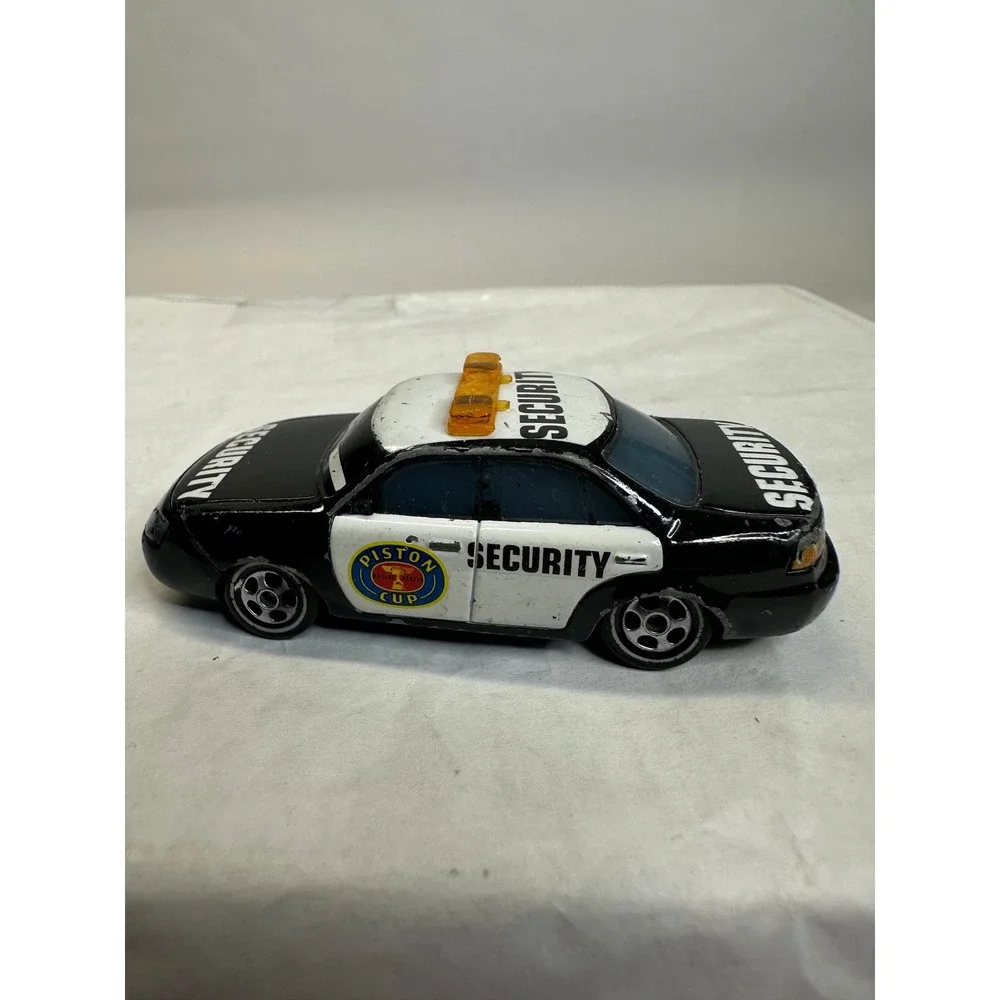 Disney Pixar Cars Marlon Clutches Security Vehicle Black White‎ Piston Cup Toy